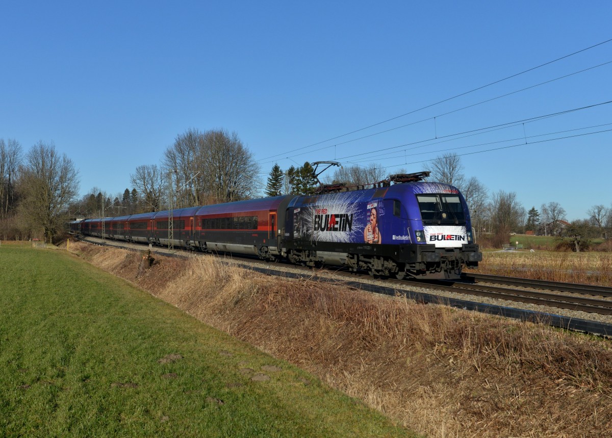 1116 222 mit einem Railjet nach Zrich am 27.12.2013 bei Brannenburg.