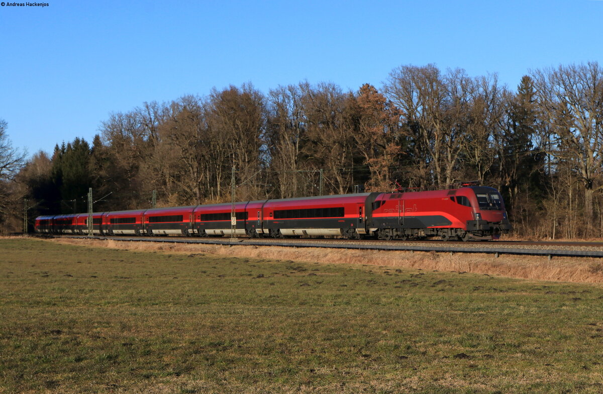 1116 247 mit dem RJX 862 (Flughafen Wien – Bregenz) bei Brannenburg 12.2.22