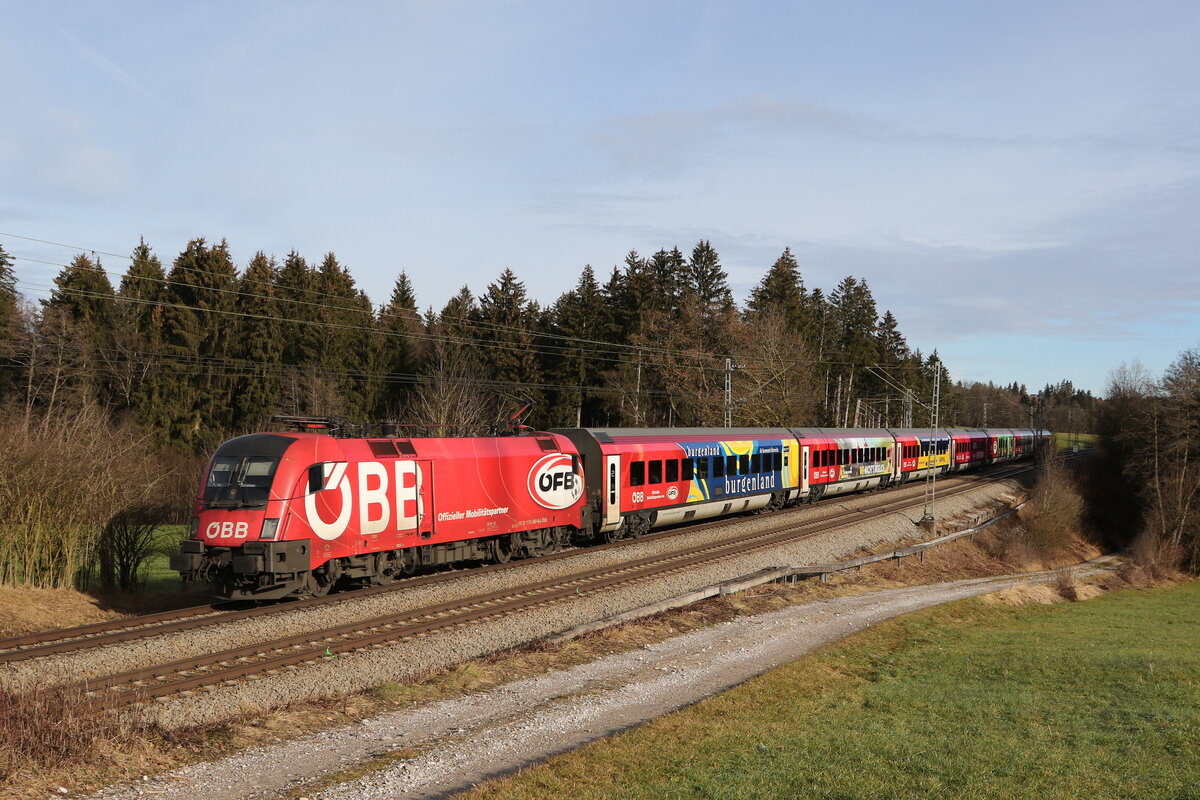 1116 249 mit dem  ÖFB-Railjet  aus Salzburg kommend am 4. Januar 2023 bei Sossau im Chiemgau.