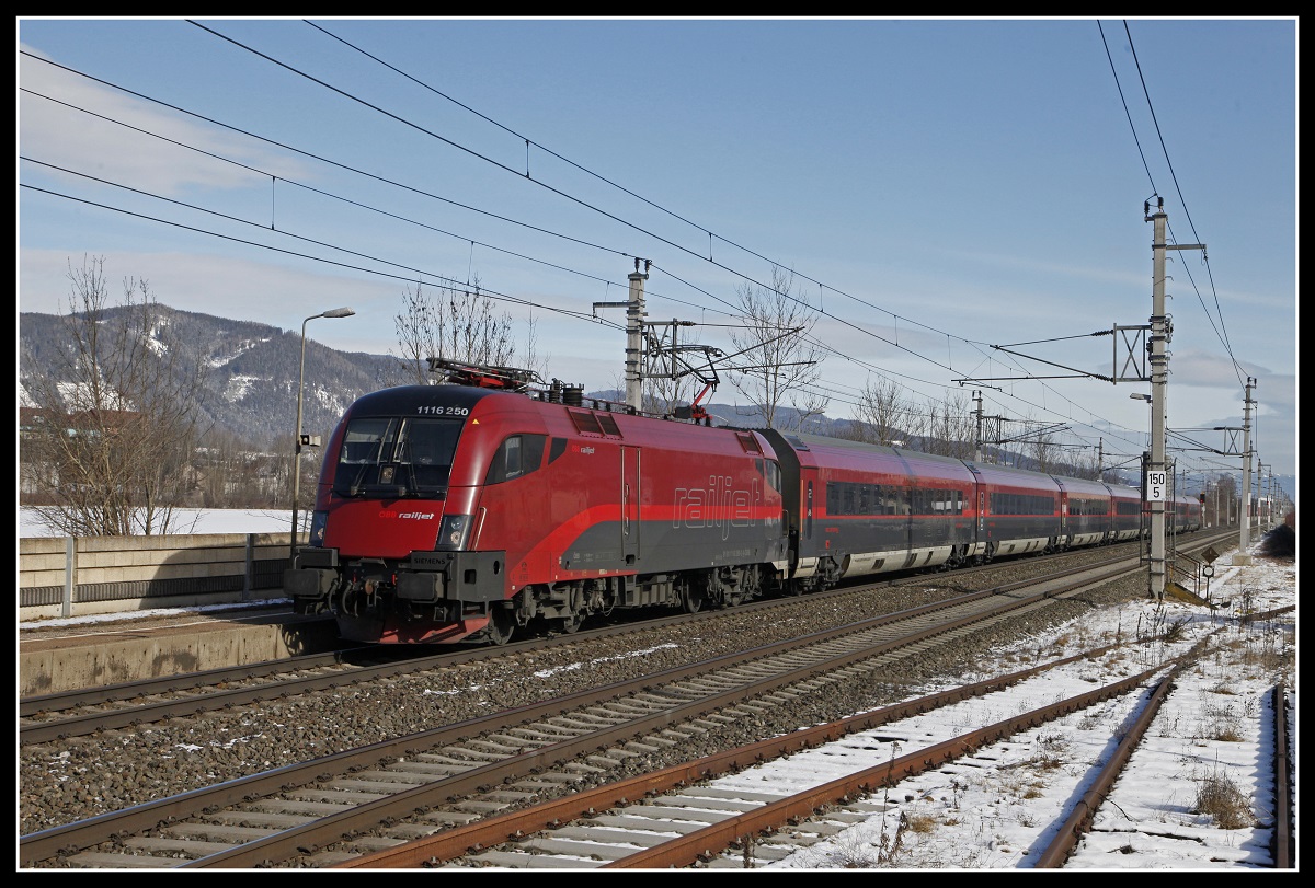 1116 250 mit Railjet in Kapfenberg Fachhochschule am 6.02.2020.