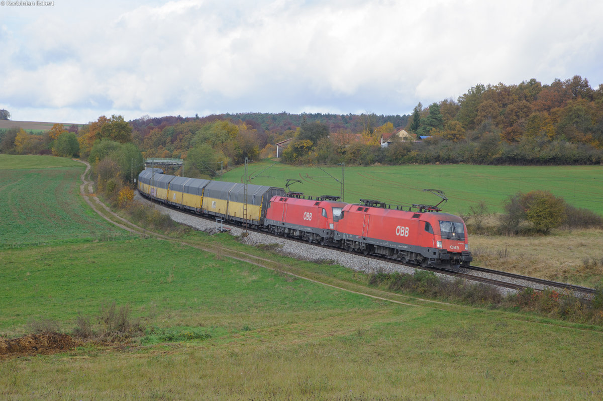 1116 259 und 1116 256 mit einem Autotransportzug Richtung Regensburg bei Edlhausen, 02.11.2016