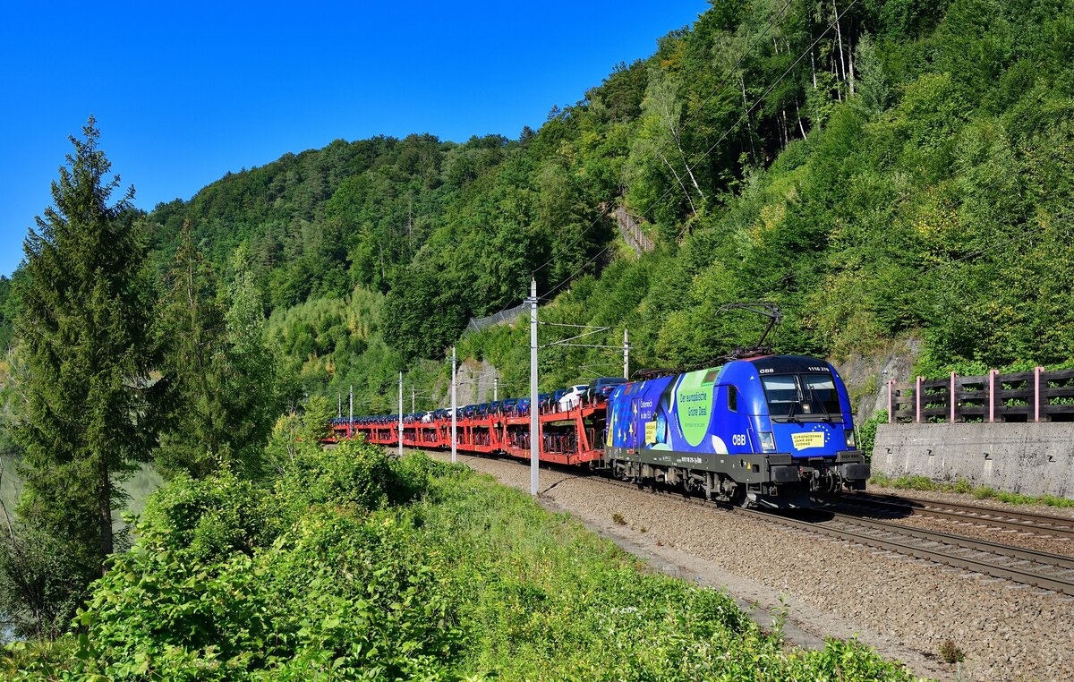 1116 276 mit einem Autozug am 22.07.2022 bei Ingling.