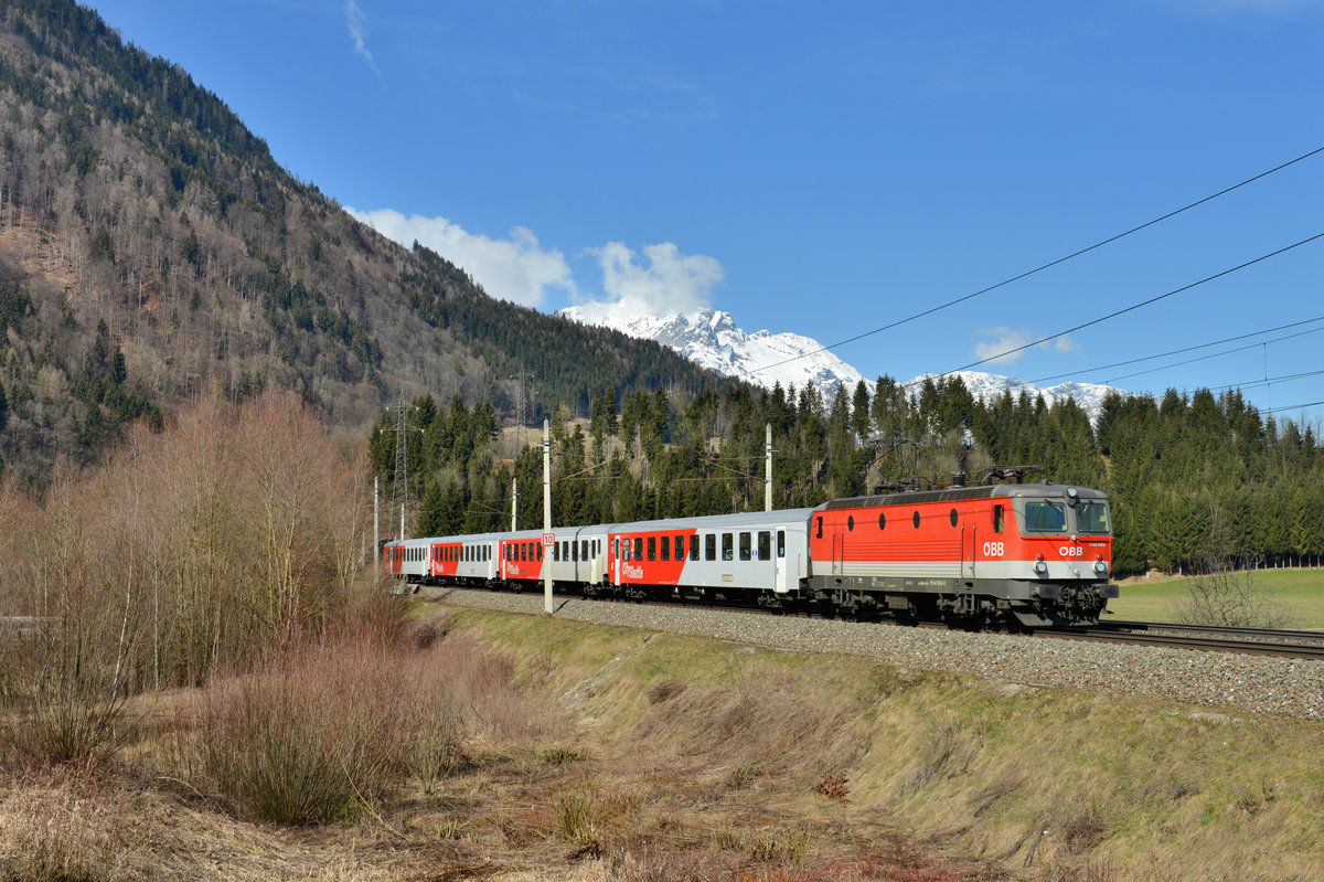 1144 054 mit einem REX am 10.03.2016 bei Bischofshofen. 