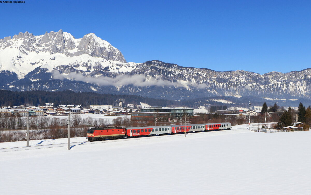 1144 092 mit dem REX 1510 (Schwarzach-St.Veit – Wörgl Hbf) bei Oberndorf in Tirol 9.2.22
