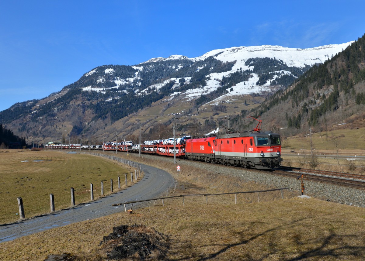 1144 212 + 1016 007 mit einem Autozug am 07.03.2015 bei Dorgastein.