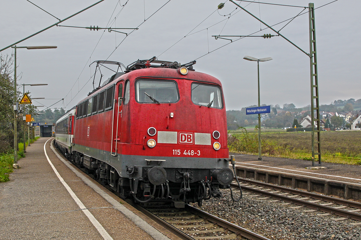 115 448-3 braust mit dem Ic Stuttgart Hbf nach Zürich HB in Welschingen vorbei.Bild vom 30.10.2014