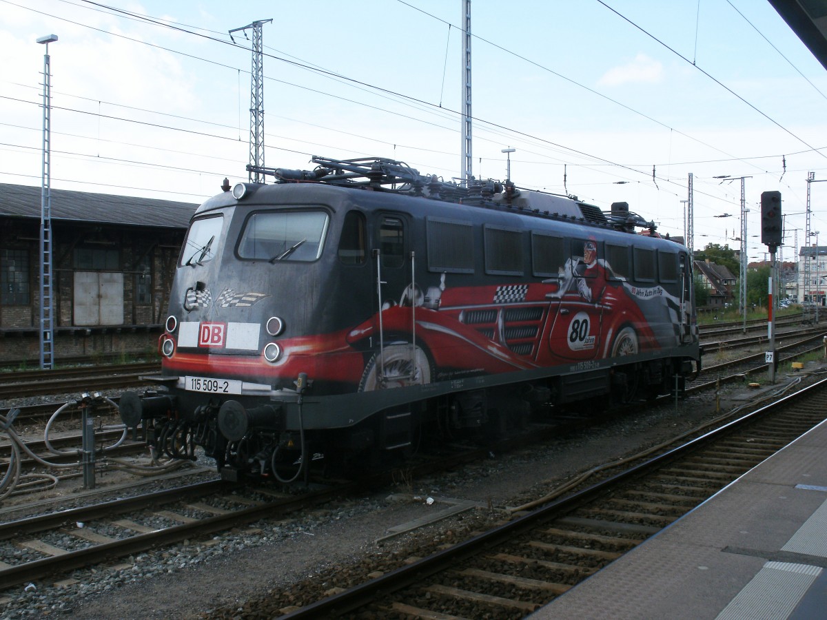 115 509 stand abgebgelt auf Gleis 7,am 21.August 2013,im Stralsunder Hbf.