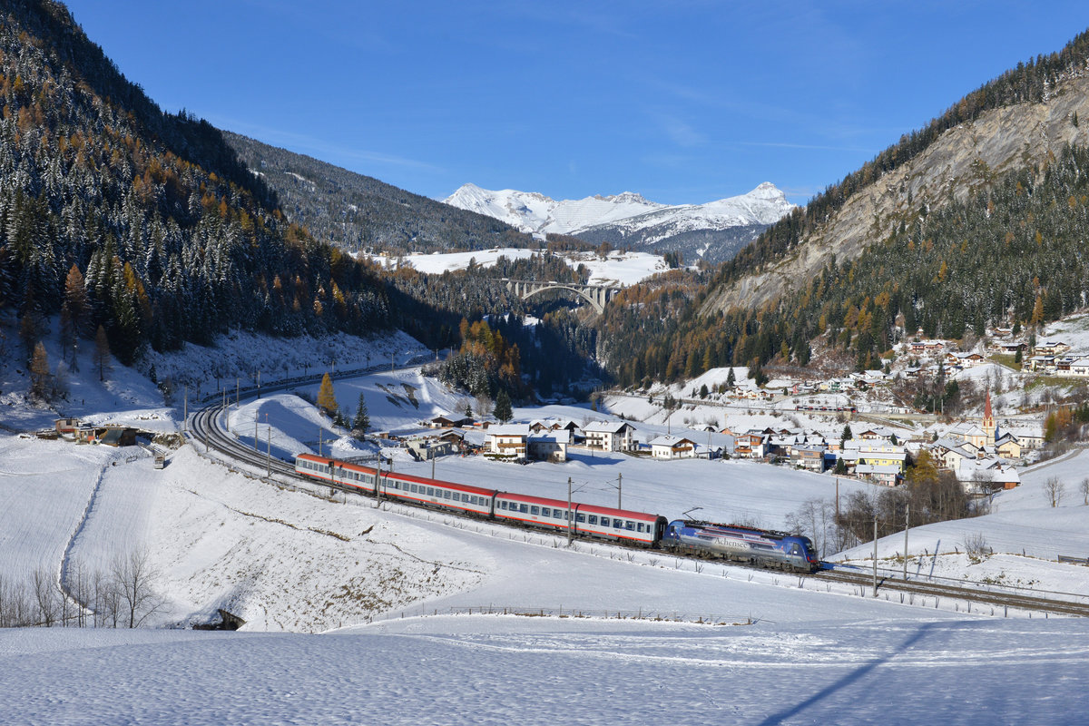 1216 019 mit einem REX am 15.11.2016 bei St. Jodok am Brenner. 