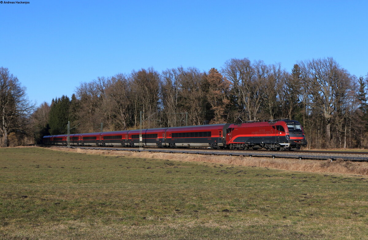 1216 020 mit dem RJX 564 (Flughafen Wien – Innsbruck Hbf) bei Brannenburg 12.2.22