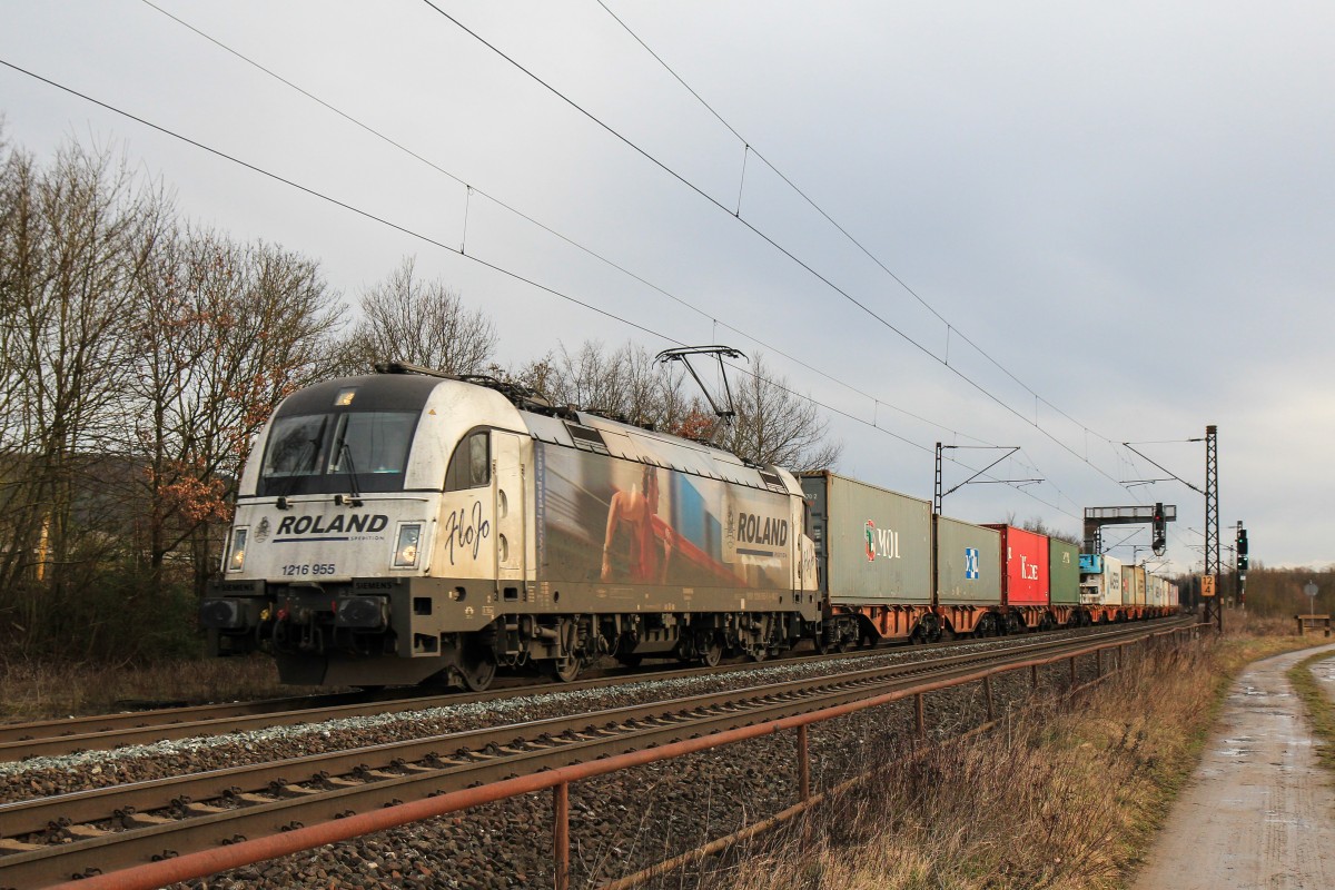1216 955 mit einem Containerzug am 21. Februar 2014 bei Thüngersheim.
