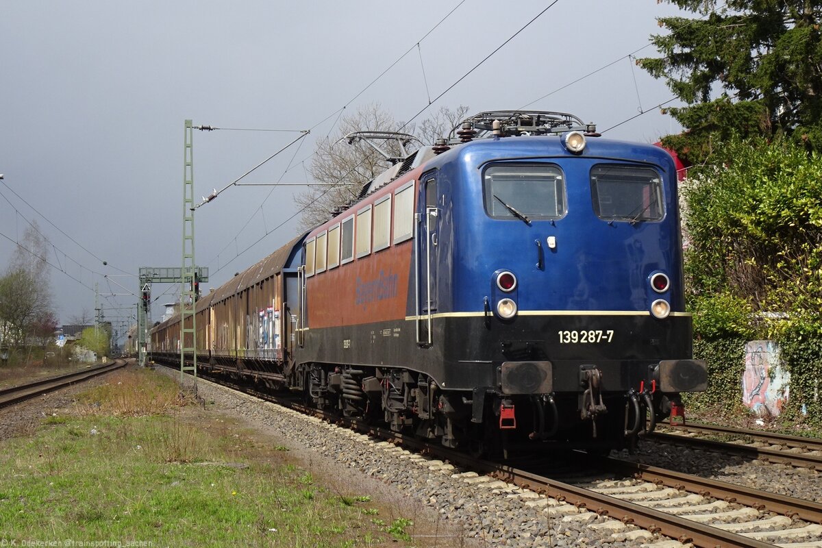139 287 durchfährt mit dem 'Henkelzug' Hennef (Sieg) am 14. April 2021.