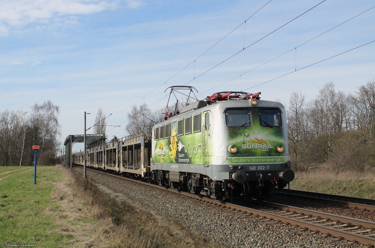 140 002-7 der EVB mit leerem Autologistiker bei Woltorf am 22.03.2017