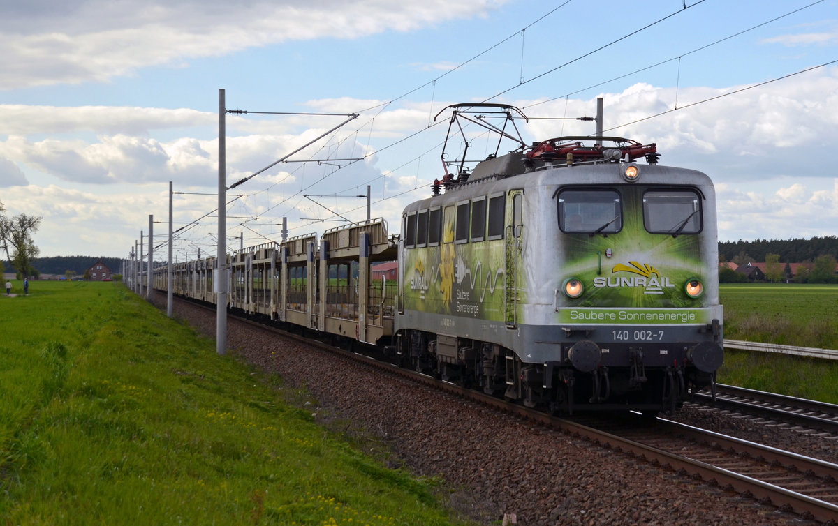 140 002 der EVB schleppte am 29.04.17 einen leeren Autozug durch Rodleben nach Falkenberg(E), wo sich das Umschlagzentrum der BLG befindet.
