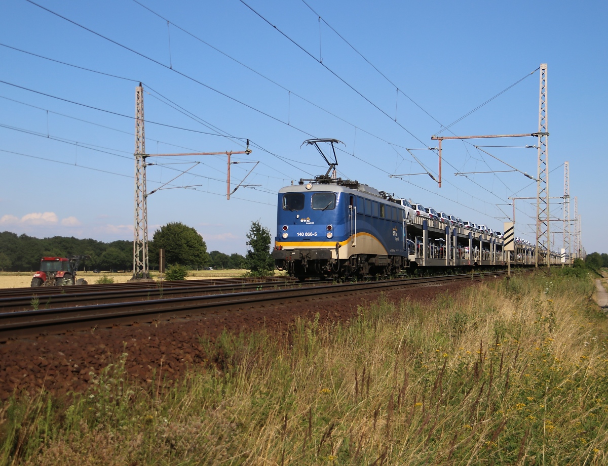 140 866-5 der EVB/MWB mit Autotransportzug aus Richtung Seelze kommend. Aufgenommen am 23.07.2014 bei Dedensen-Gümmer. 