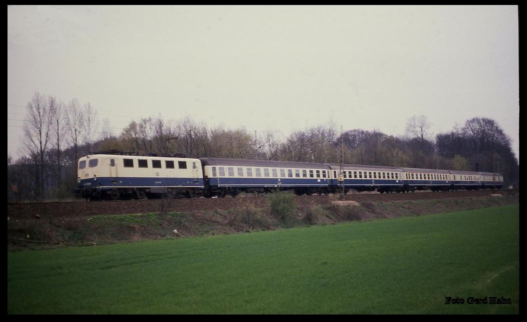 141336 mit E 3274 an 4.4.1989 um 12.33 Uhr bei Natrup - Hagen in Richtung Münster.