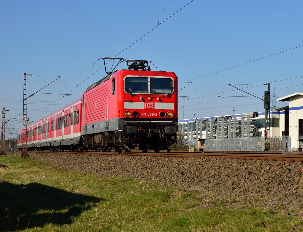 143 036-2 als S6 mit einem X-Wagenzug nach Köln Nippes. 9.3.2014