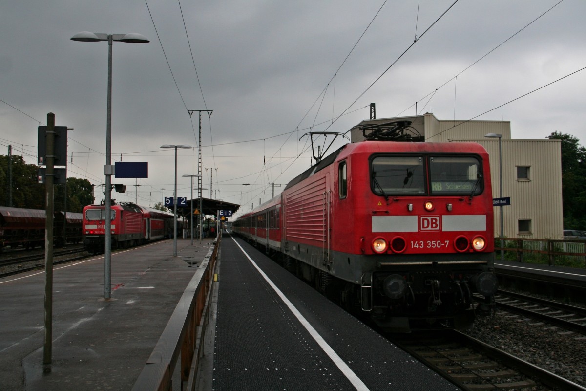 143 350-7 mit einer RB von Offenburg nach Schliengen am Nachmittag des 30.07.14 in Mllheim (Baden).