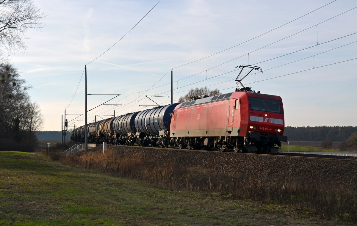 145 001 schleppte am 19.01.19 einen Kesselwagenzug durch Burgkemnitz Richtung Wittenberg.