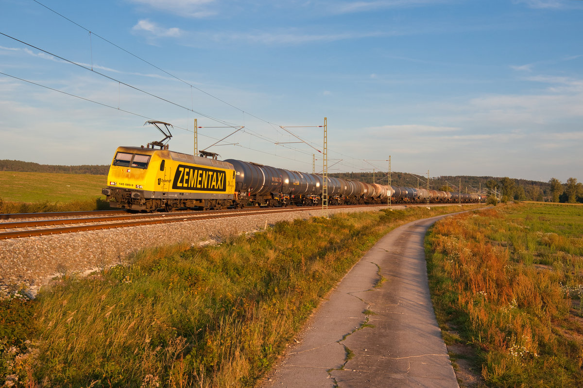 145 089 RHC  Zementtaxi  mit einem Kesselwagenzug bei Mitteldachstetten Richtung Würzburg, 17.09.2019