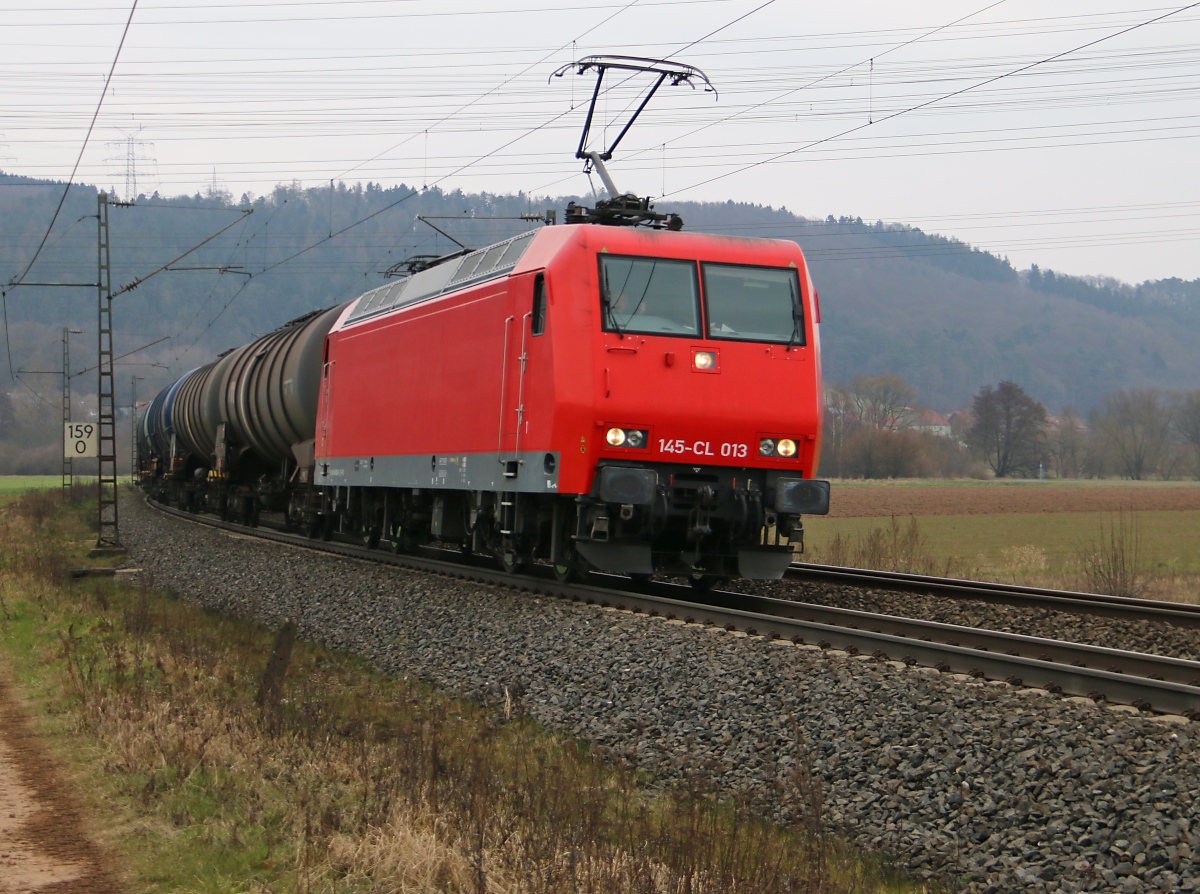 145-CL 013 mit Kesselwagenzug in Fahrtrichtung Süden. Aufgenommen zwischen Mecklar und Ludwigsau-Friedlos am 11.03.2016.