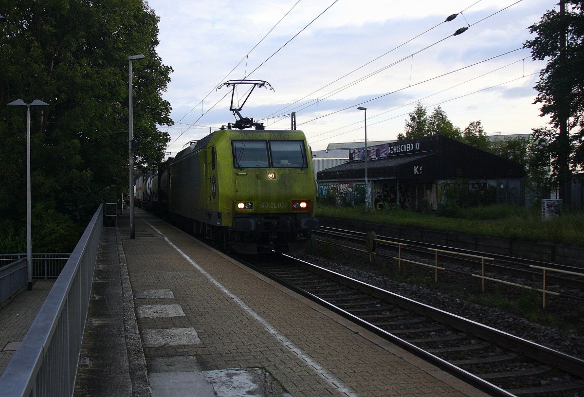 145 CL-031 von Alpha Trains kommt die Kohlscheider-Rampe hoch aus Richtung Neuss,Herzogenrath mit einem langen Containerzug aus Ruhland(D) nach Antwerpen-Combinant(B) und fährt durch Kohlscheid in Richtung  Richterich,Laurensberg,Aachen-West bei Sonne und Wolken am Morgen vom 29.8.2014.