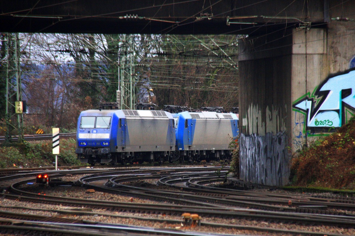 145 CL-203 von Crossrail und zwei 185er alle drei von Crossrail stehen auf dem Abstellgleis in Aachen-West bei Regenwolken am 28.12.2013.