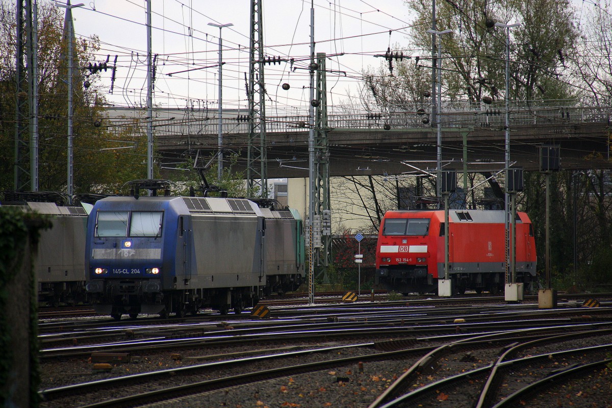145 CL-204 von Crossrail rangiert in Aachen-West. 
Aufgenommen vom Bahnsteig in Aachen-West. 
Bei Regenwolken am 15.11.2015.