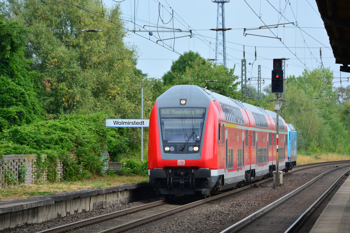 146 013 fährt mit ihren 3 Dostos als RE20 nach Magdeburg in Wolmirstedt ein.

Wolmirstedt 22.07.2018