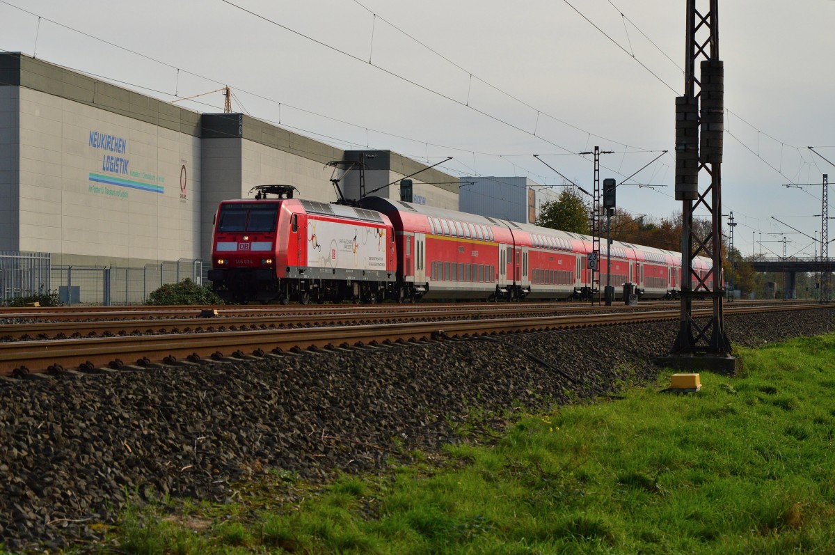 146 024 mit einem RE1 von Aachen nach Hamm Westfalen bei Langenfeld Berghausen. 9.11.2014