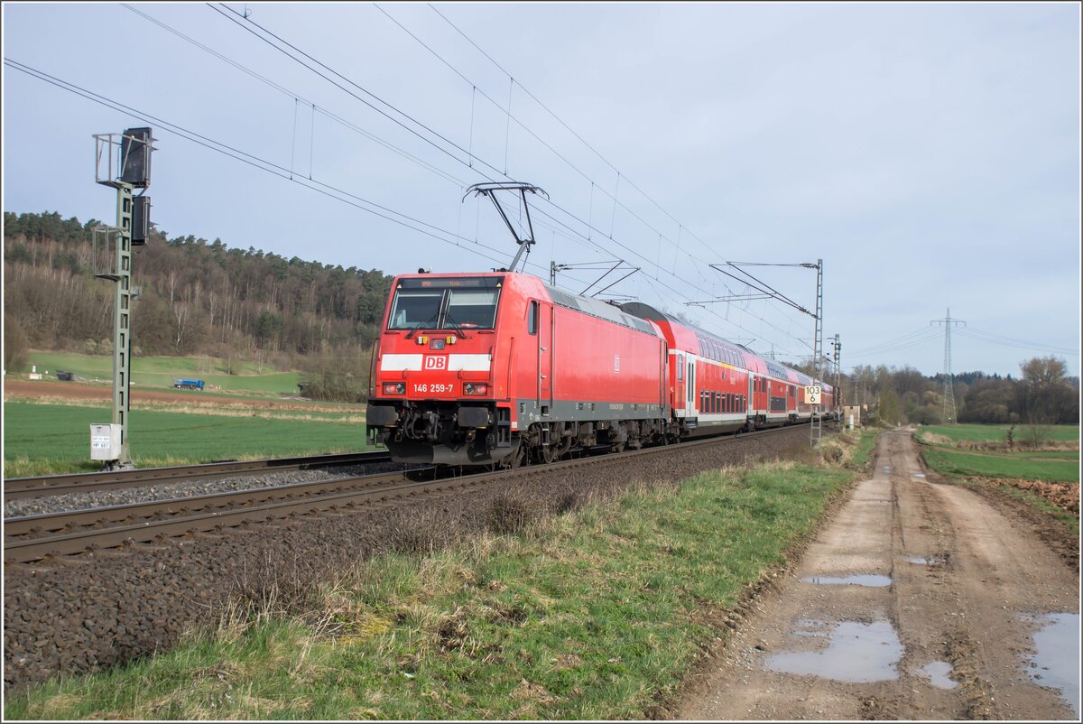 146 077-3 als Regionalbahn (RB5) in Richtung Fulda unterwegs gesehen am 26.03.2024 bei Kerzell.