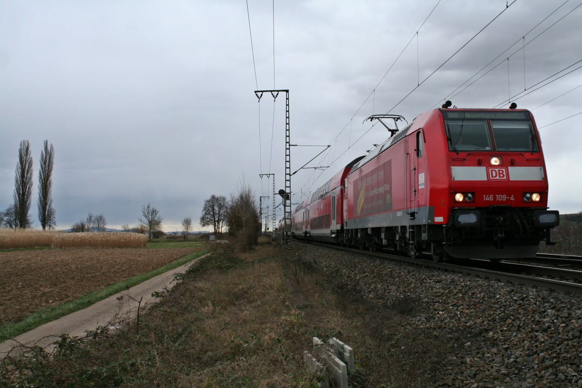 146 109-4 mit einer RB nach Neuenburg (Baden) am Nachmittag des 28.02.14 bei der Einfahrt in den Bahnhofsbereich von Mllheim (Baden).