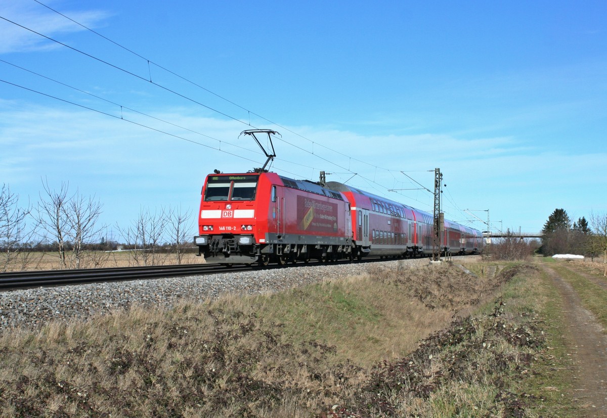 146 110-2 mit dem RE 26508 von Basel ber Freiburg (Breisgau) Hbf nach Offenburg am frhen Nachmittag des 06.02.14 bei Hgelheim.