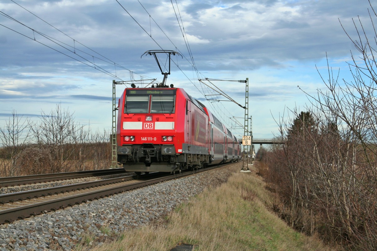 146 111-0 mit einem RE von Basel ber Freiburg im Breisgau nach Offenburg am Vormittag des 06.01.14 bei Hgelheim.