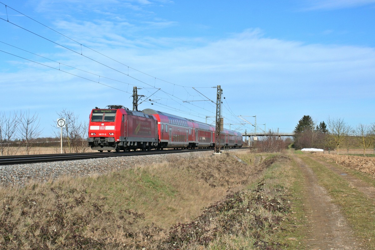 146 111-0 mit einem RE von Offenburg nach Basel Bad. bf am Nachmittag des 06.02.14 westlich von Hgelheim.