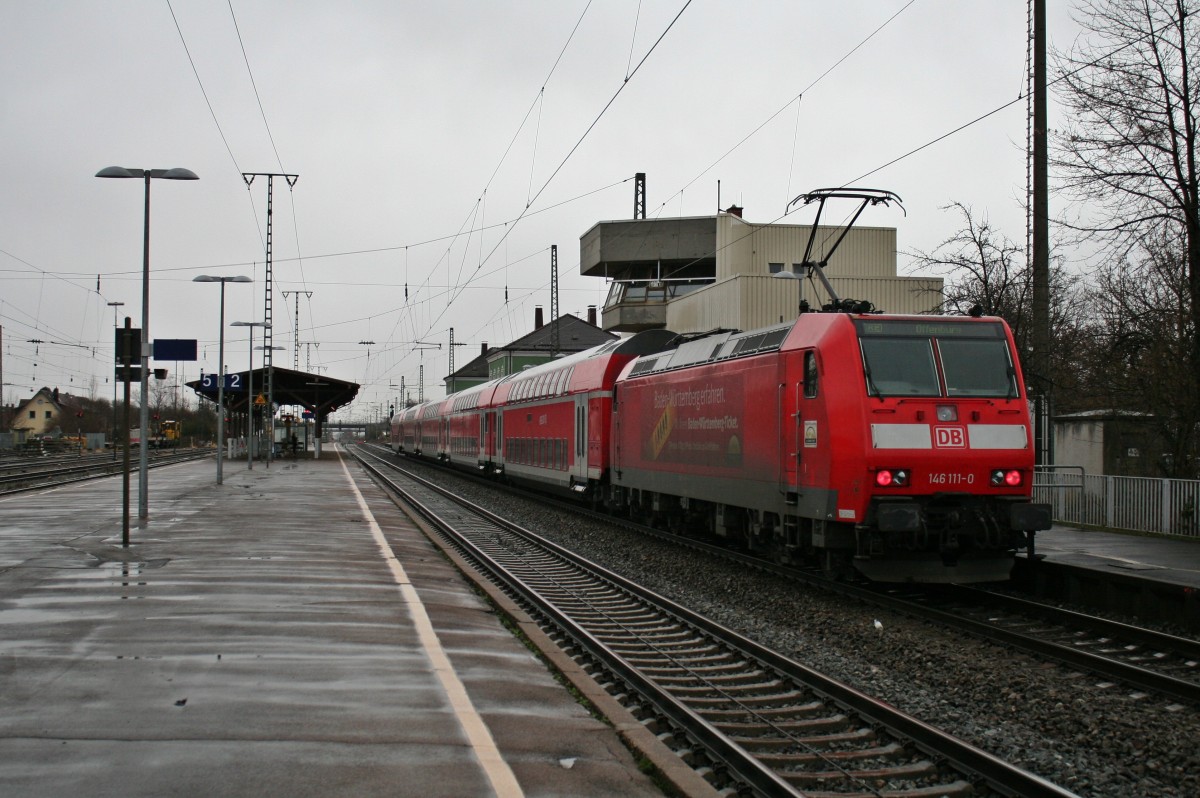 146 111-0 mit einem RE von Basel nach Offenburg am Nachmittag des 28.02.14 beim Halt in Mllheim (Baden).