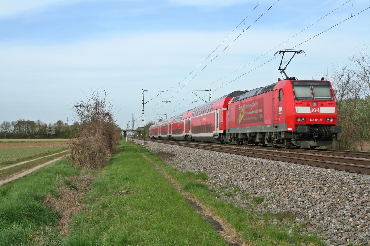 146 111-0 mit einem RE von Basel über Freiburg (Breisgau) nach Offenburg am Nachmittag des 02.04.14 südlich von Buggingen.