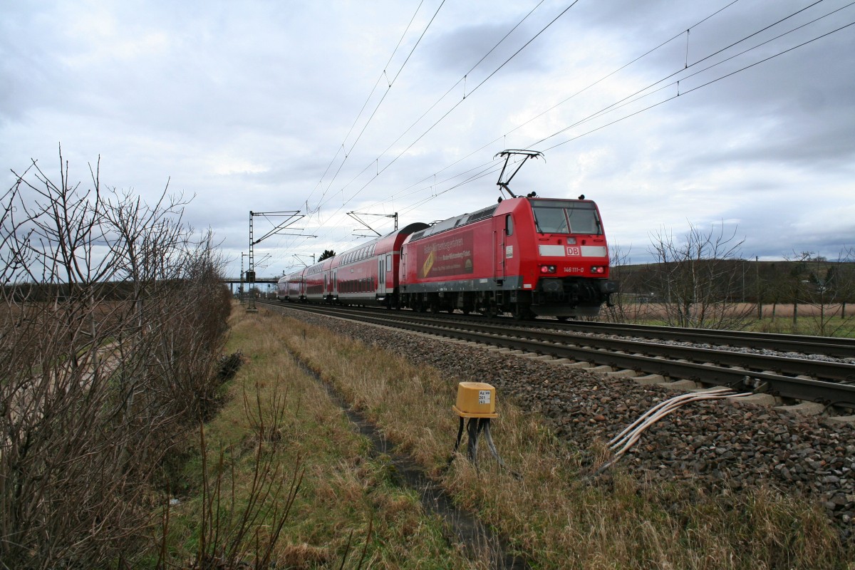 146 113-6 mit einem RE von Basel Bad. Bf nach Offenburg am Nachmittag des 03.01.14 bei Hgelheim.