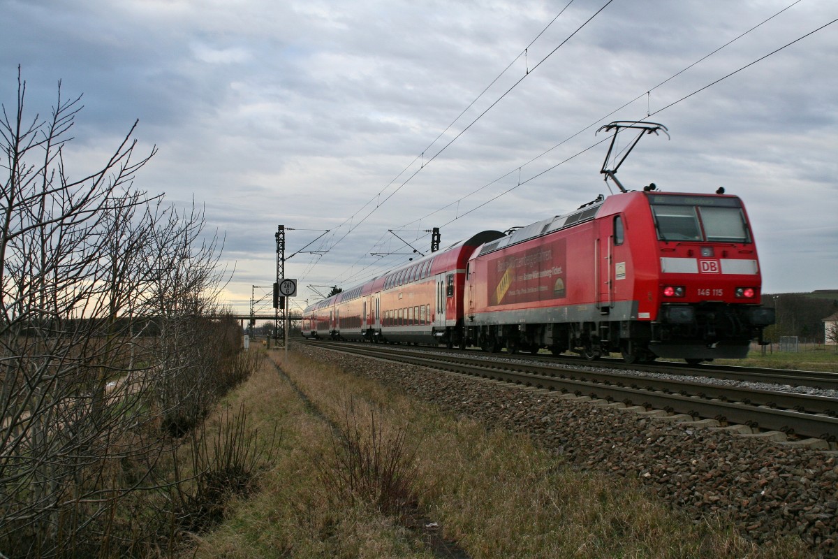 146 115 mit einem RE von Basel ber Freiburg (Breisgau) Hbf nach Offenburg am Nachmittag des 06.01.14 bei Hgelhem.