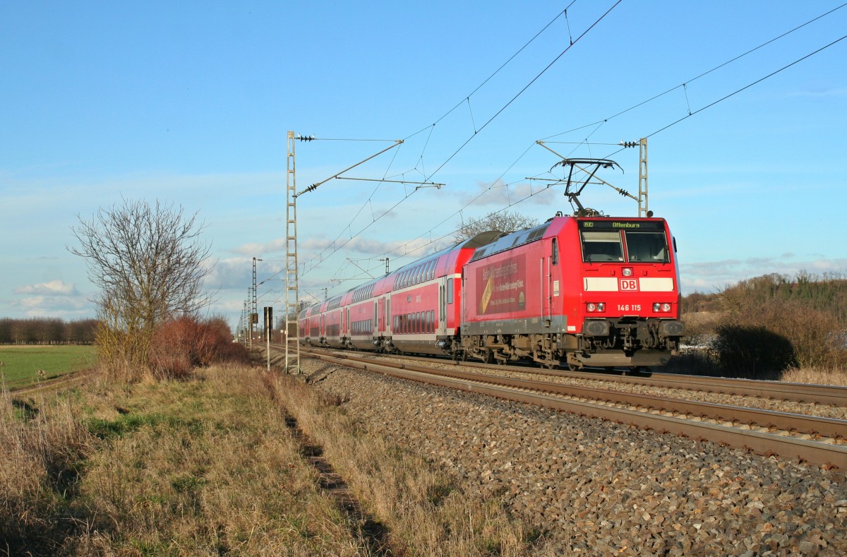 146 115 mit einem RE von Basel ber Freiburg (Breisau) Hbf nach Offenburg am Nachmittag des 11.02.14 nrdlich von Hgelheim.