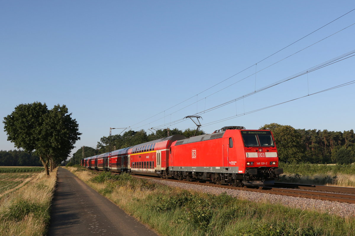 146 129 mit einem Regionalzug auf dem Weg nach Bremerhaven am 26. Juni 2020 bei Dörverden.