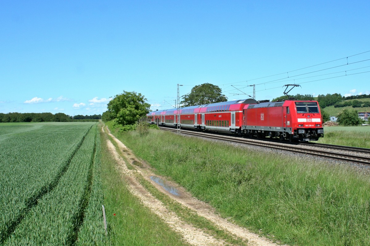 146 230-8 mit einem RE von Schliengen nach Offenburg am Nachmittag des 23.05.14 bei Hgelheim.