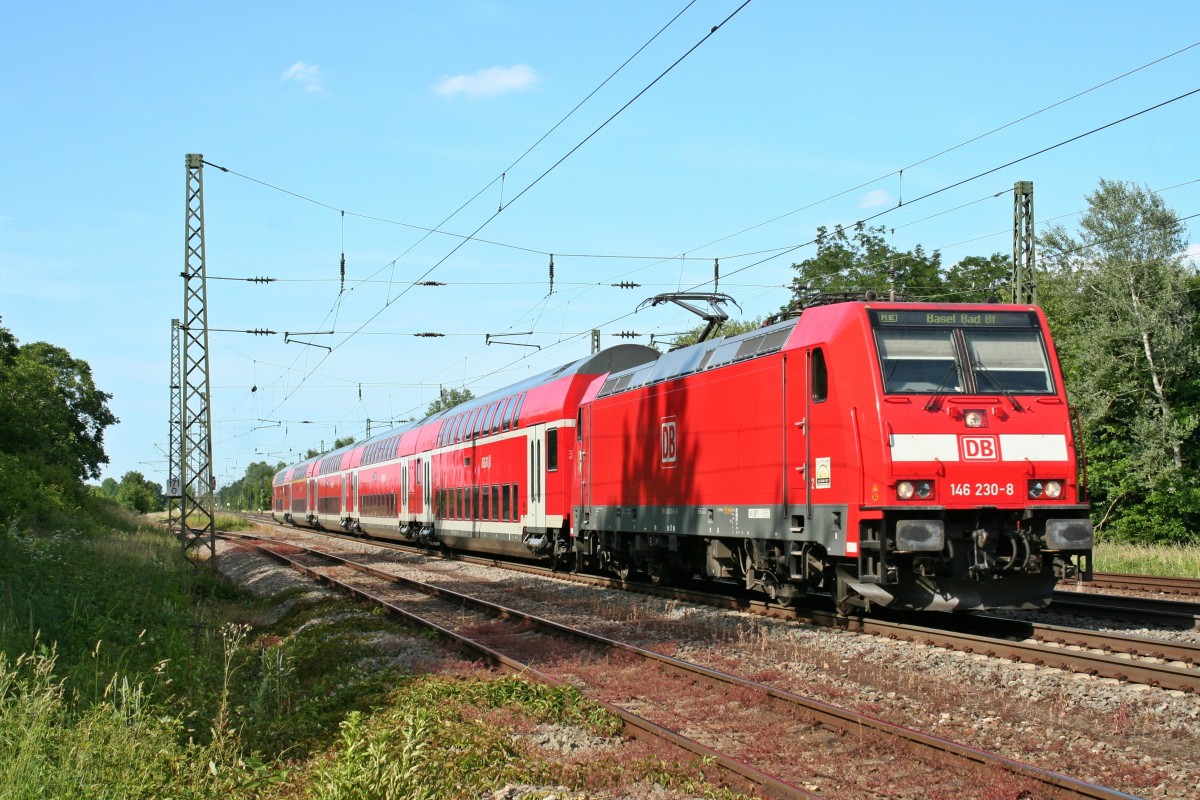 146 230-8 mit einem RE von Offenburg nach Basel Bad. Bf am Nachmittag des 06.06.14 whrend dem Anflug auf Orschweier.