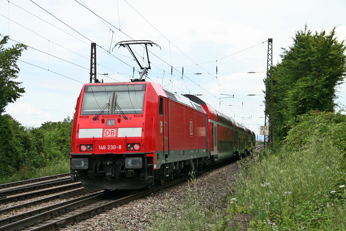 146 230-8 mit einer RB von Neuenburg (Baden) nach Freiburg (Breisgau) Hbf am Nachmittag des 12.07.14 n�rdlich von Leutersberg.