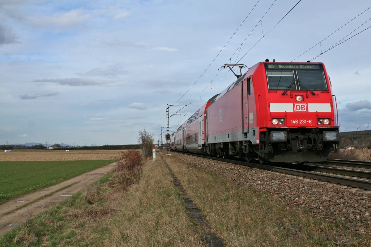 146 231-6 mit einer RB von Offenburg nach Neuenburg (Baden) am Nachmittag des 27.02.14 bei Hgelheim.