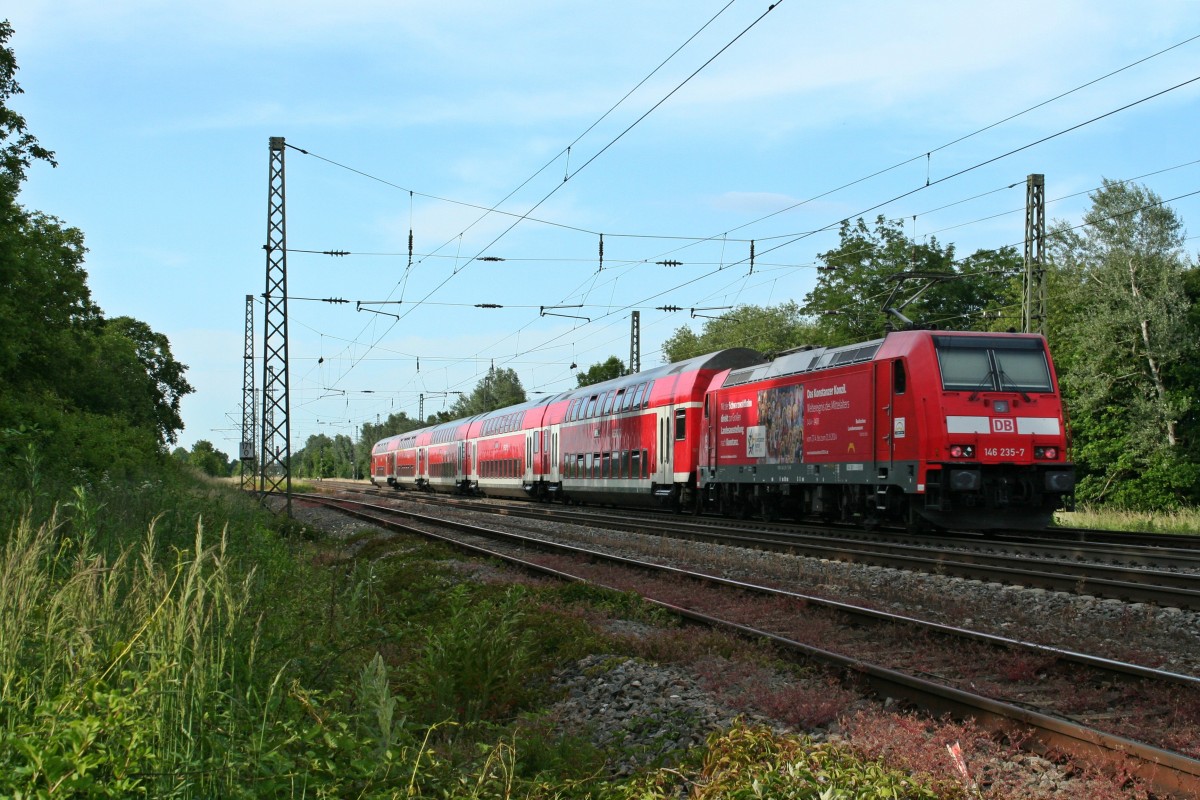 146 235-7 mit einem RE nach Offenburg am Nachmittag des 06.06.14 im Bahnhof Orschweier.