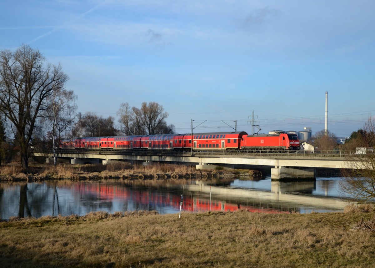 146 240 mit einem RE nach Passau Hbf am 12.01.2014 auf der Isarbrcke bei Plattling.