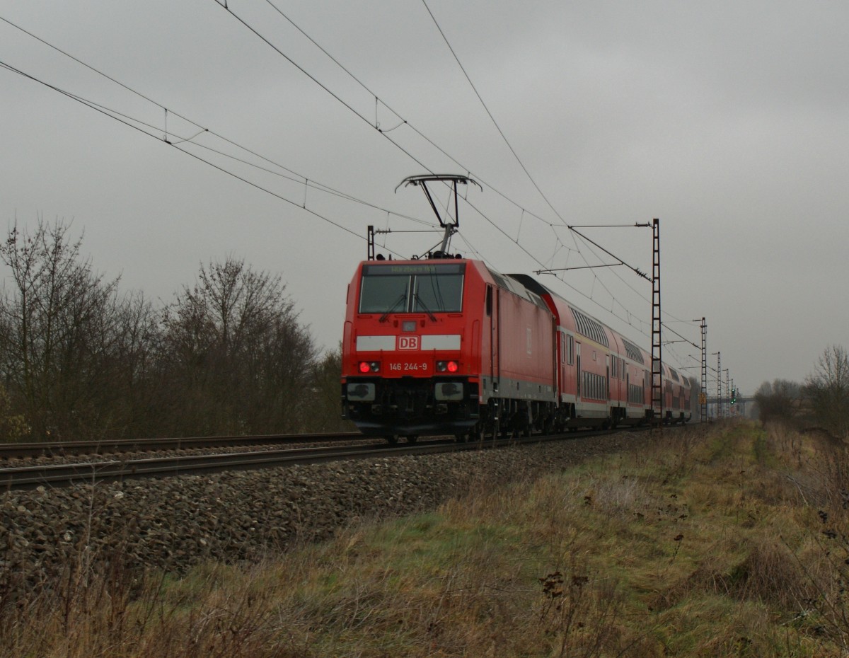 146 244-9 schiebt einen RE nach Würzburg von Frankfurt/M. kommend am 22.01.14 bei Thüngersheim.