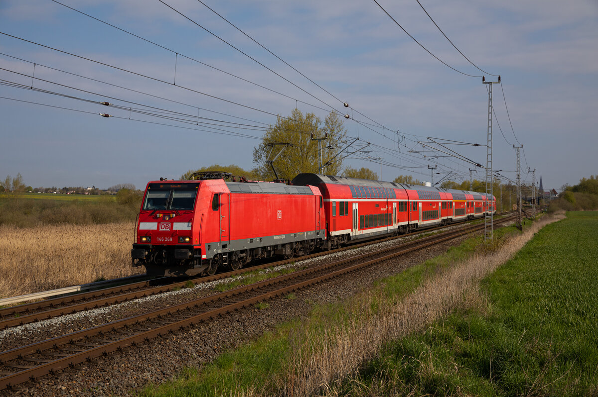146 269 am 29.04.2023 mit dem RE1 Rostock - Hamburg, in Sildemow.

