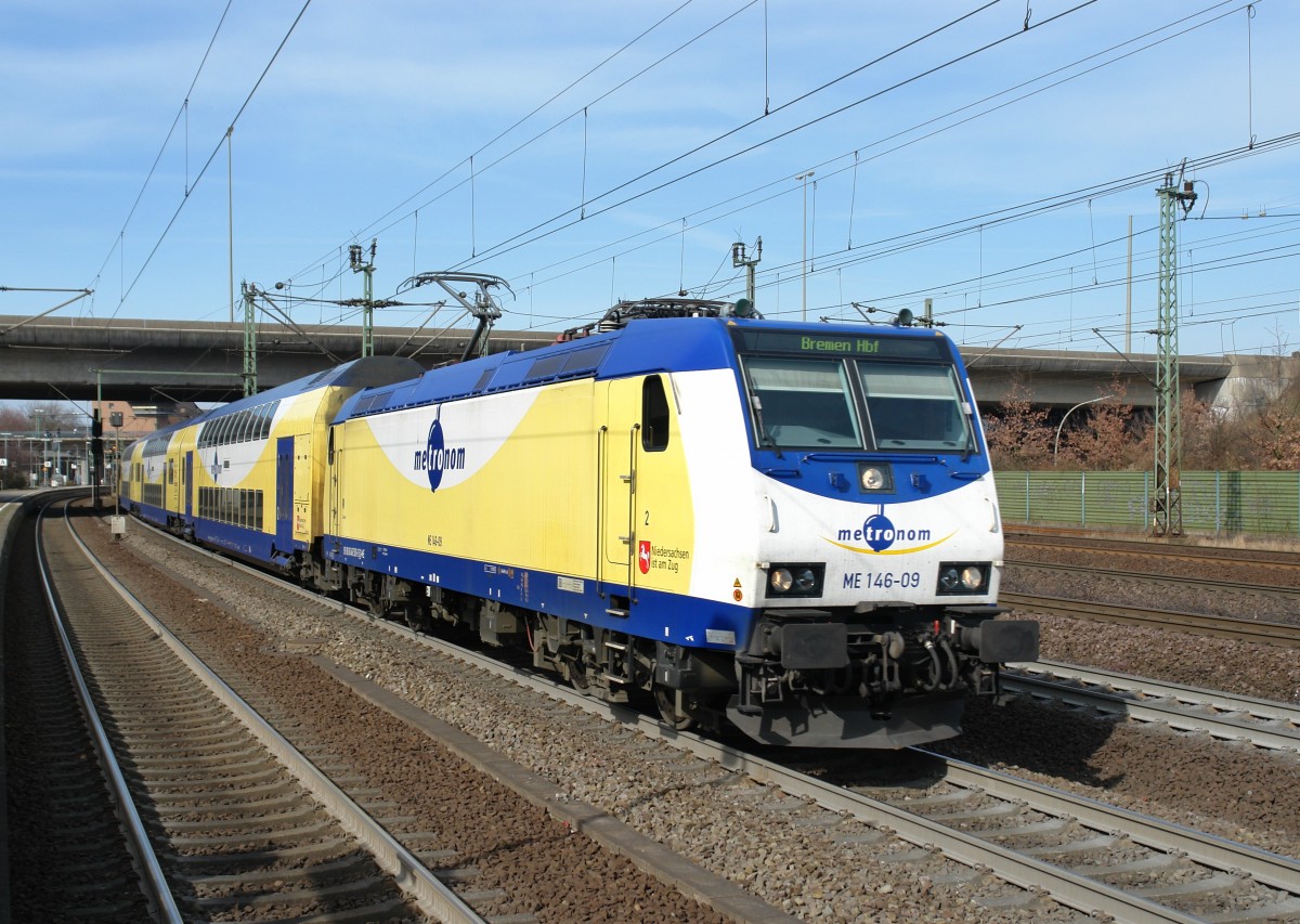 146 509 (146-09) mit einem Metronom nach Bremen am 21.03.2009 bei der Ausfahrt in Hmburg-Harburg.