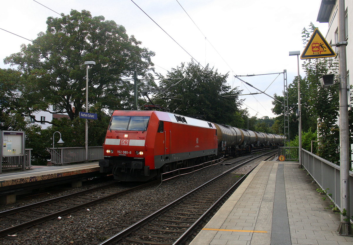 152 080-8 DB kommt aus Richtung Aachen-West mit einem Kesselzug aus Antwerpen-Noord(B) nach Burghausen-Wackerwerk(D) und fährt durch Aachen-Schanz in Richtung Aachen-Hbf,Aachen-Rothe-Erde,Stolberg-Hbf(Rheinland)Eschweiler-Hbf,Langerwehe,Düren,Merzenich,Buir,Horrem,Kerpen-Köln-Ehrenfeld,Köln-West,Köln-Süd. Aufgenommen vom Bahnsteig von Aachen-Schanz.
Am Abend vom 8.8.2016.